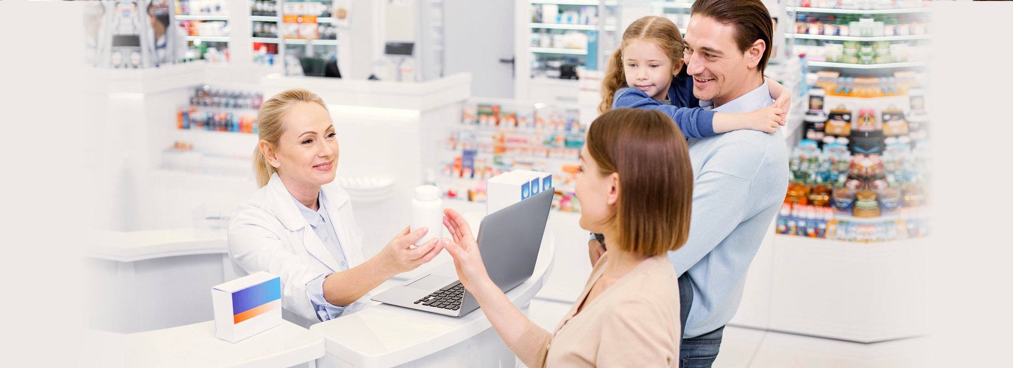pharmacist giving medicine to her customer